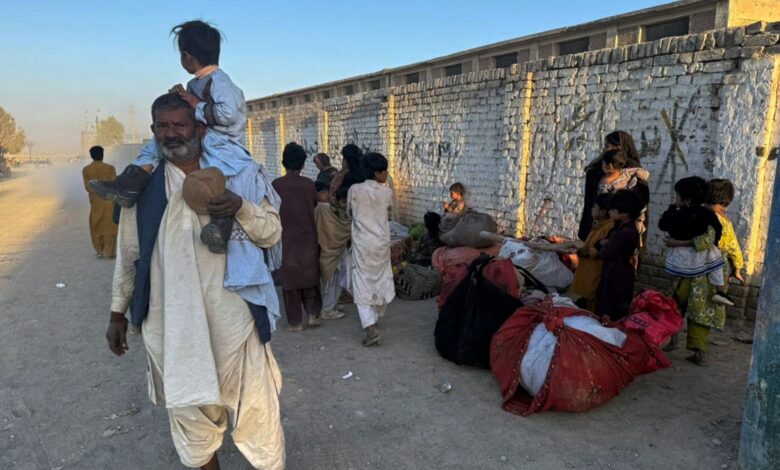 Local residents, who fled their homes following border clashes between Pakistan and Afghan forces wait for transportation in Chaman a town on the Pakistan side of the Afghanistan border (PTI)