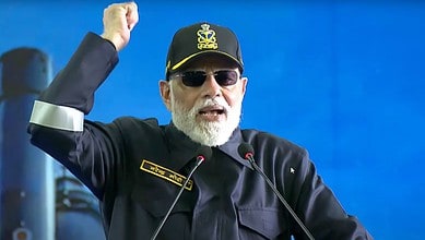 Prime Minister Narendra Modi addresses the Indian Navy personnel during Diwali celebration aboard INS Vikrant. (PMO via PTI Photo)