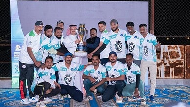 Members of Team Dracary with the trophy