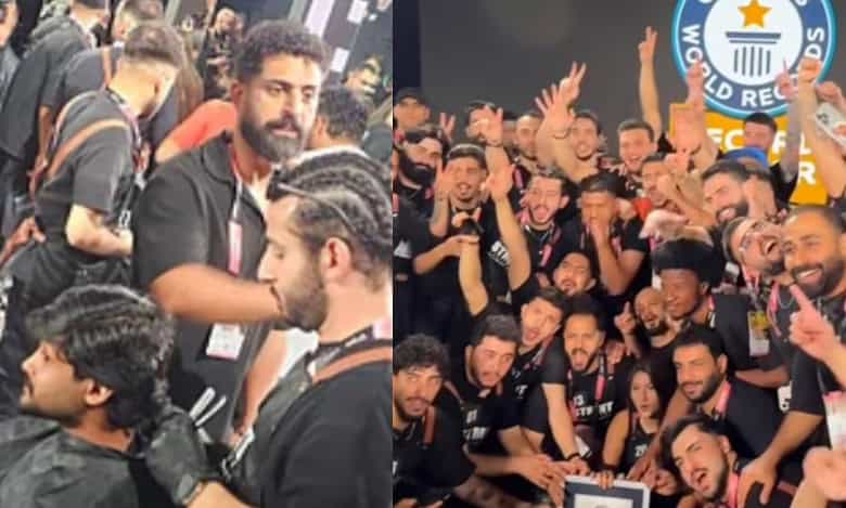 Barbers in Dubai performing beard trims and celebrating after setting a new Guinness World Record at Beautyworld Middle East 2025.