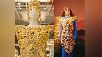 The “Dubai Dress,” crafted by Al Romaizan Gold and Jewellery, an intricately engraved 21-karat gold gown adorned with gemstones and a matching headdress.