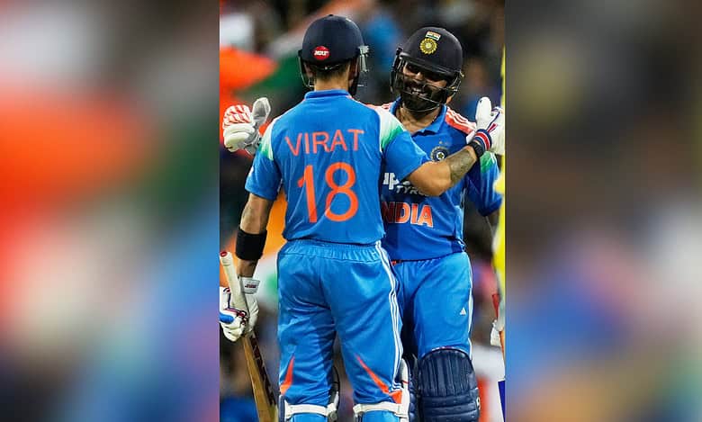 Virat Kohli and Rohit Sharma celebrate their India vs. Australia 3rd ODI