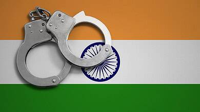 India flag and police handcuffs. Indian Justice System