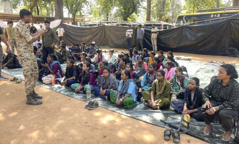 Maoists at the Border Security Force (BSF) camp after their surrender, in Kanker district, Chhattisgarh. (Handout via PTI Photo)