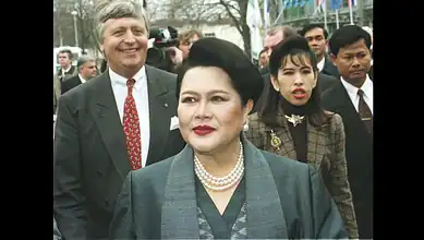 Thailand’s Queen Mother Sirikit attending a public event with officials and aides.