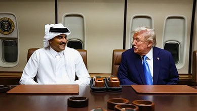 US President Donald Trump and Qatar’s Emir Sheikh Tamim bin Hamad Al Thani talking aboard Air Force One at Al Udeid airbase.