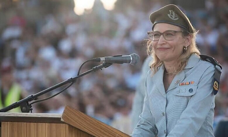 Israeli military lawyer Yifat Tomer-Yerushalmi speaking at a podium in uniform.