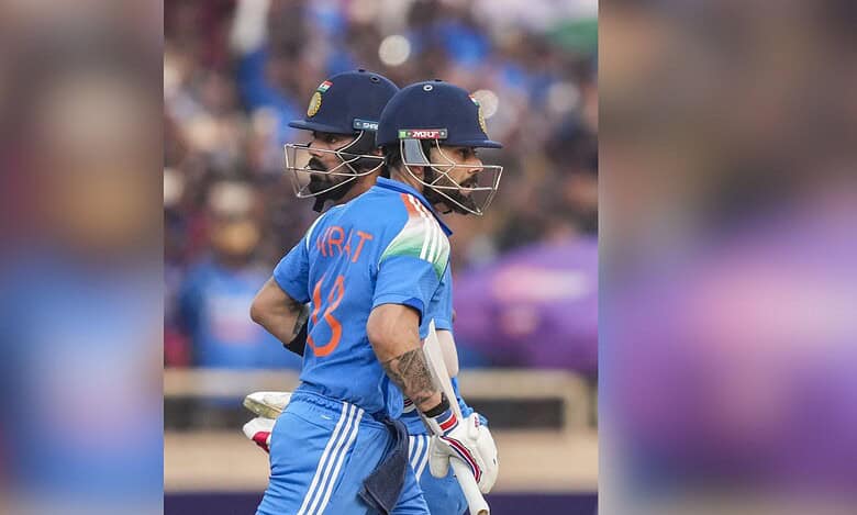 India's Virat Kohli, front, and KL Rahul run between the wickets during the first ODI cricket match of a series between India and South Africa at JSCA International Stadium Complex in Ranchi on Sunday. (PTI Photo/Kamal Kishore
