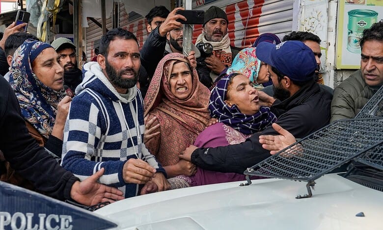 Relatives stage a protest demanding the mortal remains of Mohammad Shafi Parry