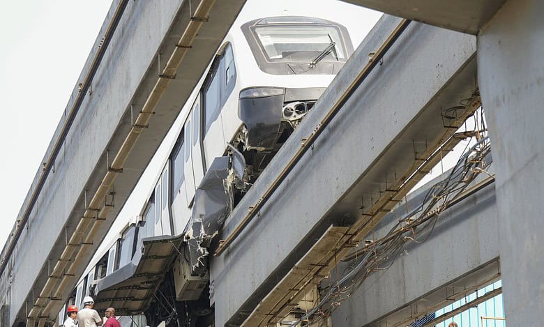 A portion of a monorail train damaged after it tilted during a test run, at Wadala depot in Mumbai, Wednesday, Nov. 5, 2025. No injury was reported in the incident, according to officials. (PTI Photo/Shashank Parade)