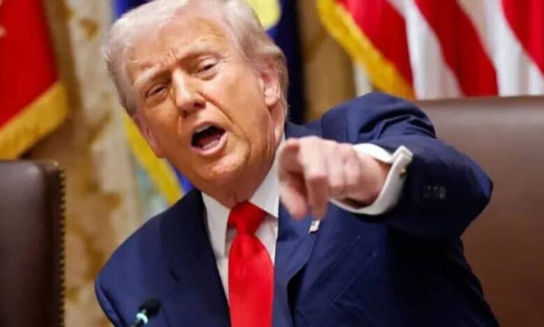 US President Donald Trump addresses a meeting