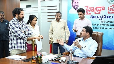 HYDRAA commissioner AV Ranganath listens to residents during prajavani