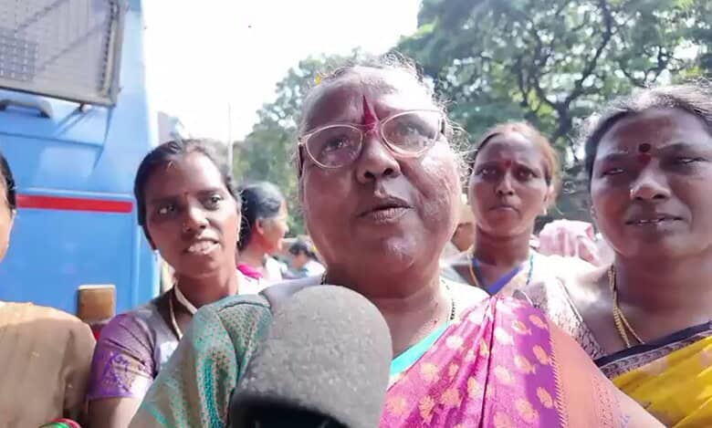 A Midday meal workers addresses the media during the protest