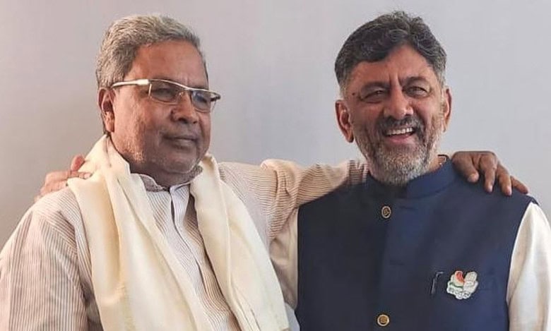 Karnataka CM Siddaramaiah (right) and his deputy DK Shivakumar
