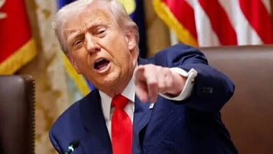 US President Donald Trump addresses a meeting