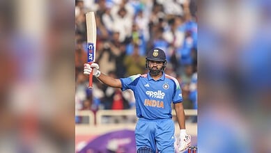 India's Rohit Sharma celebrates his half century during the first ODI cricket match of a series between India and South Africa at JSCA International Stadium Complex in Ranchi on Sunday. (PTI Photo/Kamal Kishore)