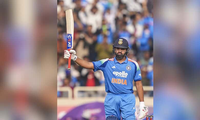 India's Rohit Sharma celebrates his half century during the first ODI cricket match of a series between India and South Africa at JSCA International Stadium Complex in Ranchi on Sunday. (PTI Photo/Kamal Kishore)