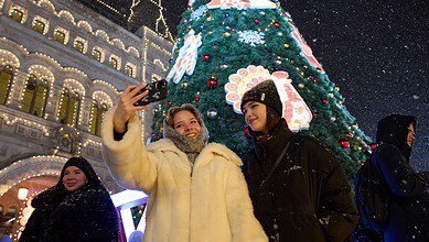 2 women take a selfie photo at the Christmas fair