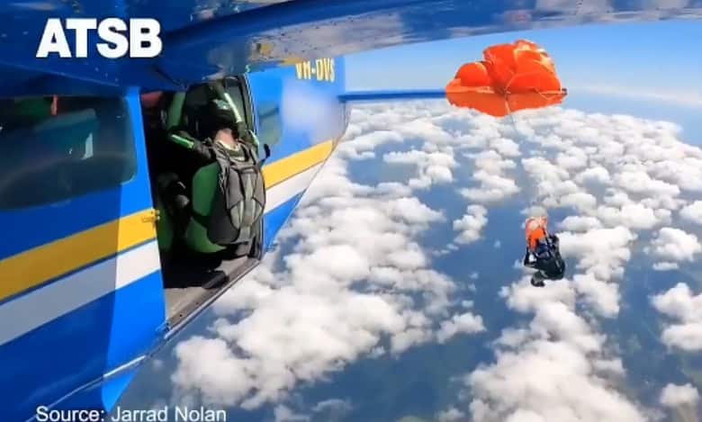Australia skydiver's parachute stuck on plane