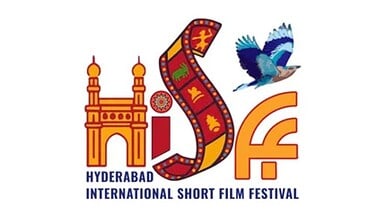 Hyderabad International Short Film Festival logo featuring Charminar monument, colorful film strip, blue bird in flight, and HISFF text