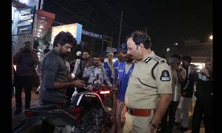 Hyderabad police commissioner VC Sajjanar inspects a vehicle during operation Kavach
