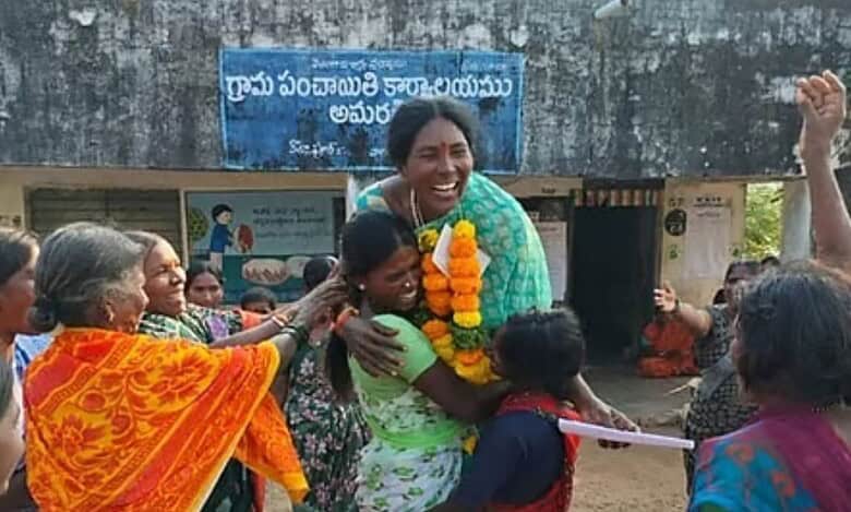 Image shows a woman being lifted up in celebration after she wins the post of sarpanch in Telangana's gram panchayat elections