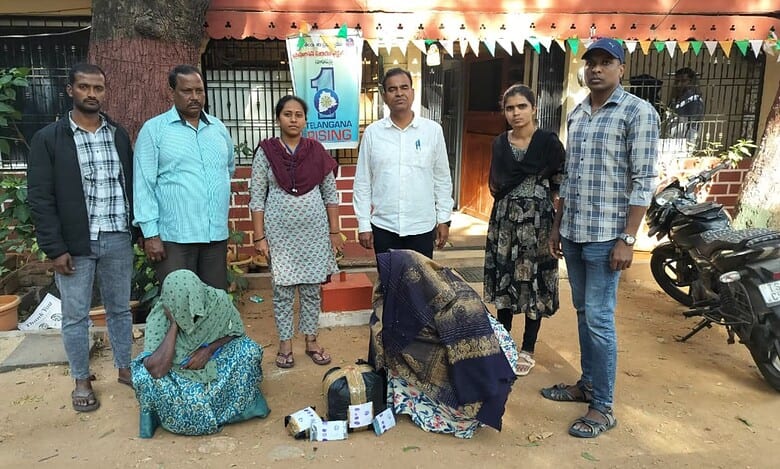 Telangana excise officials with the arrested women