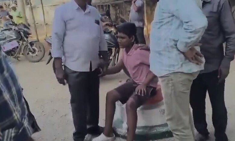 A boy is consoled after being bitten by a dog