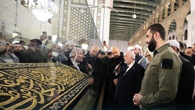 Syrian President Ahmed al-Sharaa reveals a piece of Kiswah in Damascuss