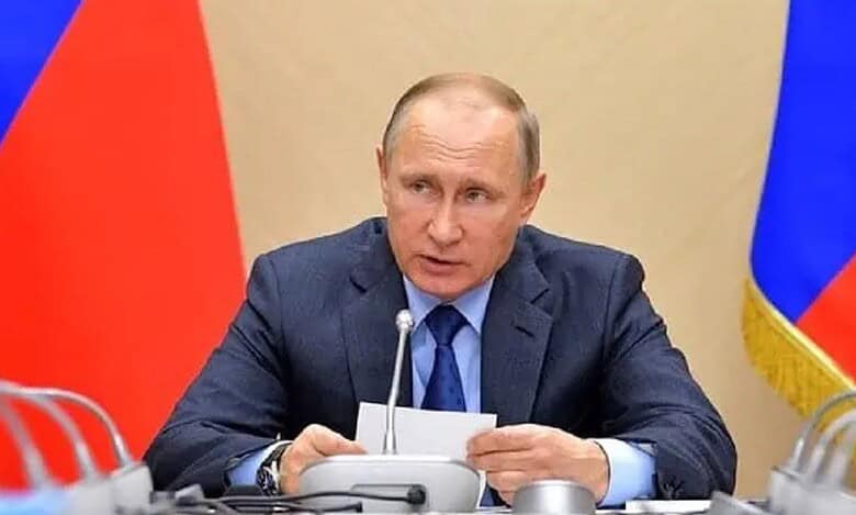 Russian President Vladimir Putin addresses a meeting