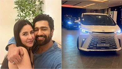 Couple taking a selfie next to luxury Lexus car at a nighttime event, showcasing elegance and vehicle sophistication.