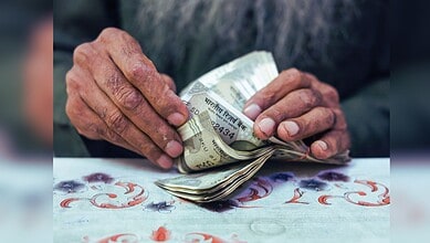 Image showing man counting Indian currency