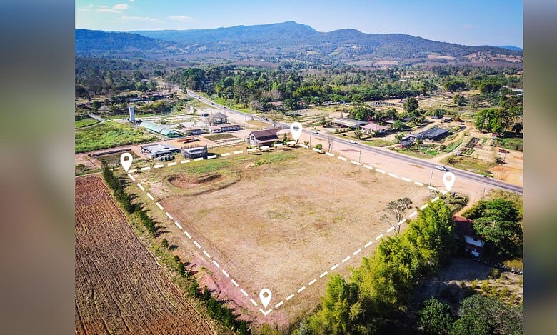 The image shows a patch of land surrounded by hills