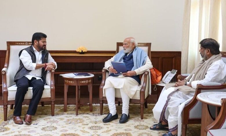 Image shows Telangana CM Revanth Reddy with Prime Minister Modi and Deputy CM Bhatti