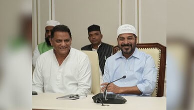 Telangana Chief Minister Revanth Reddy with Minister Mohammad Azharuddin