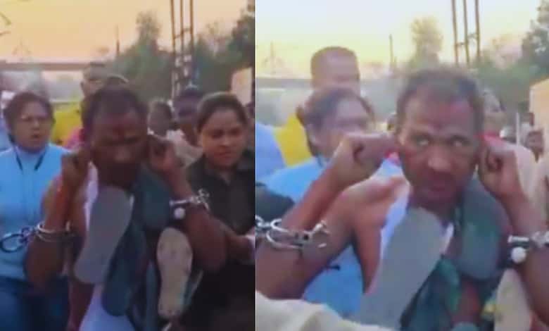Accused of tearing a woman cop's clothes, garlanded with slippers, paraded by police to send a message
