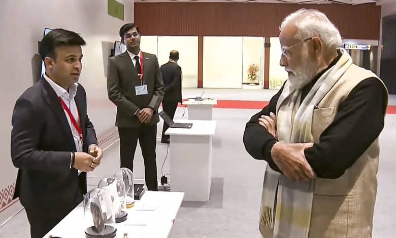 Prime Minister Narendra Modi visits an exhibition during a programme marking a decade of the Startup India initiative, in New Delhi.