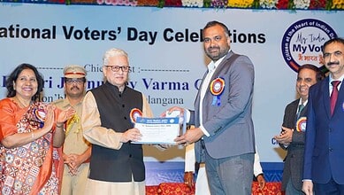 Telangana Governor Jishnu Dev Varma with GHMC Commissioner and District Election Officer, RV Karnan