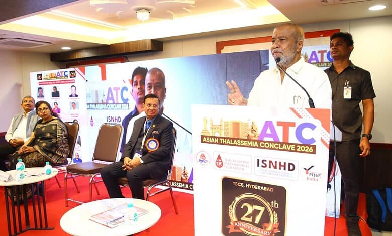 Image shows Telangana Health Minister Damodar Raja Narasimha speaking at the Asian Thalassemia Conclave at Kamala Hospital in Hyderabad