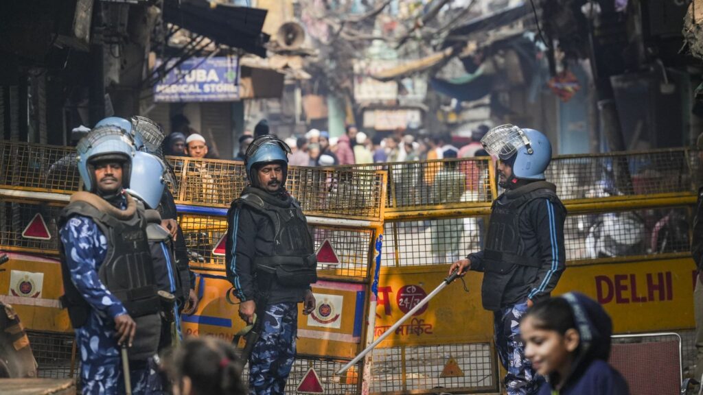 New Delhi: Security personnel stand guard during Friday prayers at Jama Masjid, in the wake of recent Turkman Gate demolition, in New Delhi, Friday, Jan. 9, 2026. (PTI Photo/Karma Bhutia)
