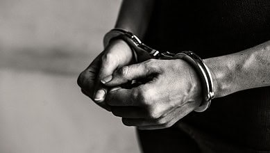 handcuffed hands