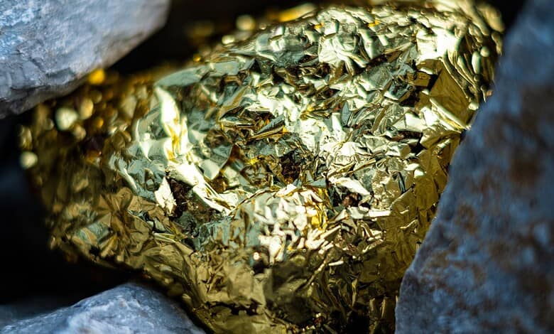 Gold nugget and grey granite stone
