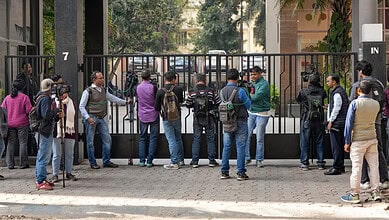 Media personnel outside the residence of Pratik Jain, director of political consultancy firm I-PAC, in Kolkata.