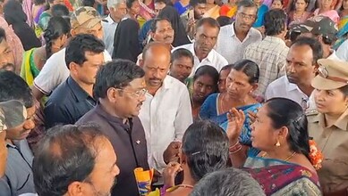Telangana Mimnister G Vivek is confronted by women