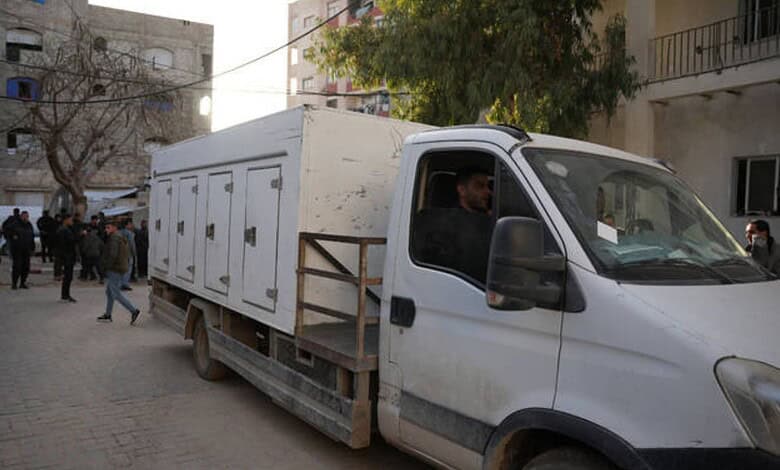 An ICRC Vehicle with Palestinian bodies enters Gaza,