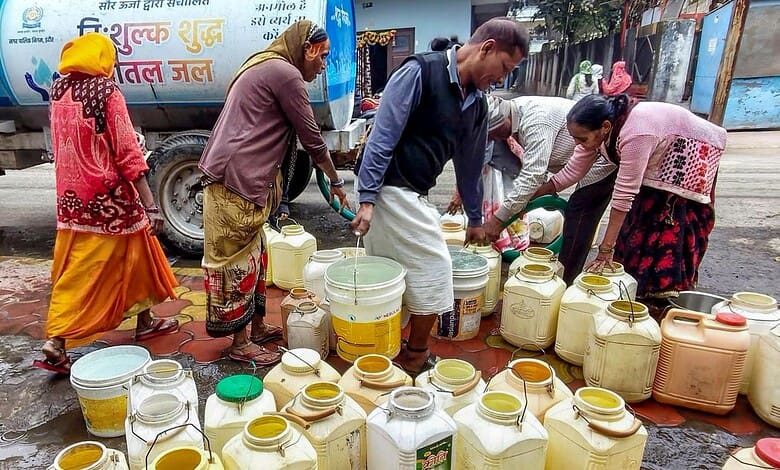 Bhagirathpura residents fill water from tankers being supplied by the local authorities in Madhya Pradesh's Indore.