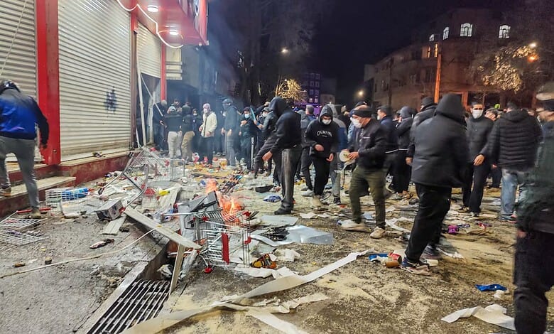 Protesters in Tehran's Grand Bazaar over failing economic policies.