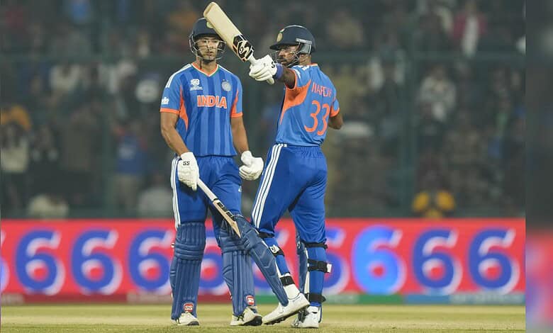 India cricket players celebrating during a match against Namibia in the T20 World Cup.