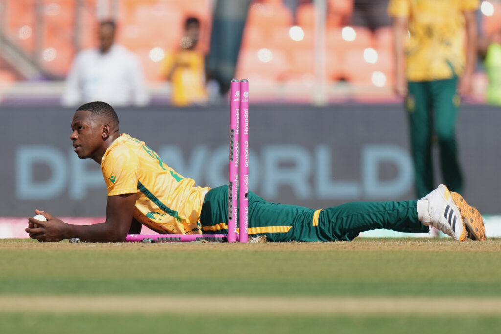 Cricket player lying on the ground after a match at T20 World Cup, South Africa vs Afghanistan.