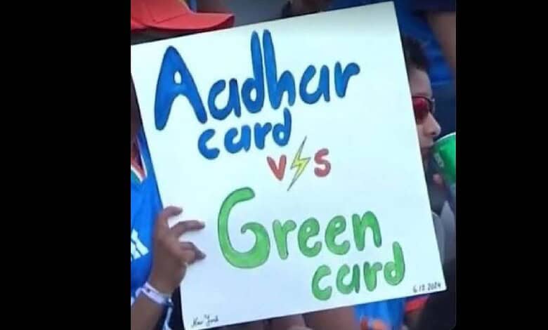 A spectator displays a poster during a T20 World Cup match in Mumbai